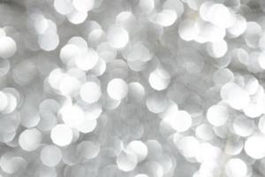 Silver sparkle background with beautiful bokeh photo