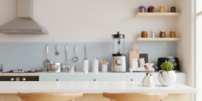 Wood table top on blur kitchen room background,Modern Contemporary kitchen room interior. photo