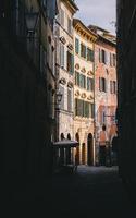 Small street in Siena, Tuscany, Italy photo