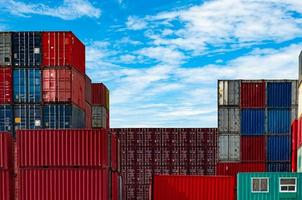Container logistic. Cargo and shipping business. Container ship for import and export logistic. Container freight station. Logistic industry from port to port. Container at harbor for truck transport. photo