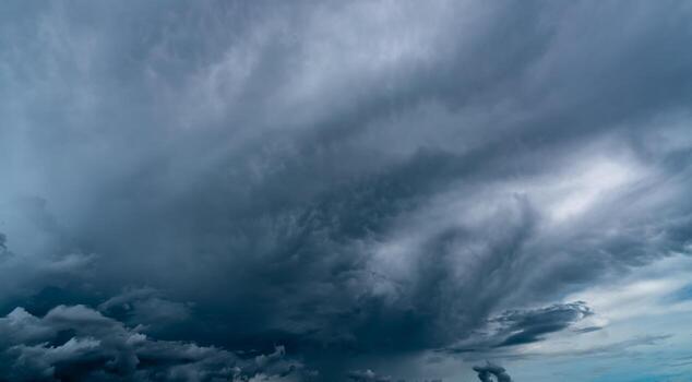 Dark dramatic sky and clouds. Background for death and sad concept. Gray sky and fluffy white clouds. Thunder and storm sky. Sad and moody sky. Nature background. Dead abstract background. Cloudscape. photo