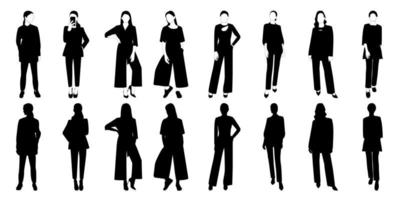 Set of vector silhouette of a slender girl, a woman in a fashionable suit standing. Adult model.