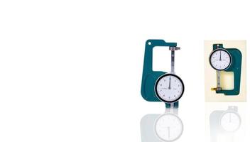 Green thickness gauge isolated on white background. Snap vernier calipers. Measuring tools. Measurement equipment. Measurement of thickness, outer diameter, inner diameter and depth. Handy size. photo