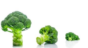 Set of green broccoli Brassica oleracea. Vegetables natural source of betacarotene, vitamin c, vitamin k, fiber food, folate. Fresh broccoli cabbage isolated on white background. photo