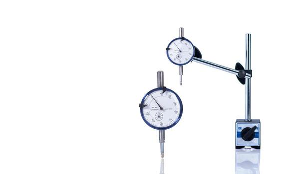 Dial gauge isolated on white background. Standard dial gauge. Dial indicator. Measuring equipment. Measurement tool. Shock proof dial gauge for measure machine in factory industry. Processing tools. photo