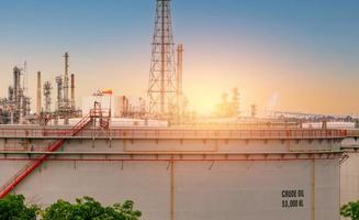 Huge crude oil tank in refinery or petroleum refinery plant. Power and energy industry. Oil and gas production plant. Petrochemical industry. Natural gas storage tank. Petroleum business. Oil market. photo