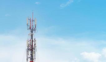 Telecommunication tower. Antenna on blue sky. Radio and satellite pole. Communication technology. Telecommunication industry. Mobile or telecom 5g network. Network connection business background. photo