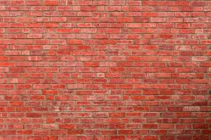 Red brick wall texture background. Background for text. Exterior architecture concept. photo