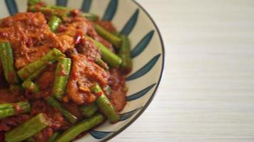 Stir fried pork with red curry paste - Thai food style
