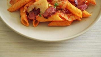 stir-fried penne pasta with kimchi and bacon - fusion food
