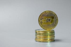 golden Dash cryptocurrency coin stack, Crypto is Digital Money within the blockchain network, is exchanged using technology and online internet exchange. Financial concept photo