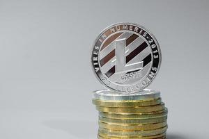 Silver Litecoin cryptocurrency coin stack, Crypto is Digital Money within the blockchain network, is exchanged using technology and online internet exchange. Financial concept photo
