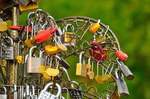 Wedding padlocks on bridge, Yaroslavl, Russia photo