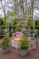 Cage with flowers in Keukenhof park, Lisse, Holland, Netherlands. photo