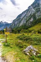 Signpost pointer in mountains Koenigssee, Konigsee, Berchtesgaden National Park, Bavaria, Germany. photo