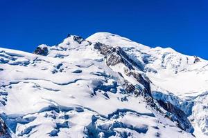 Snowy mountains Chamonix, Mont Blanc, Haute-Savoie, Alps, France photo