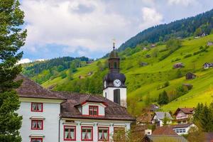 Church in village, Alt Sankt Johann, Sankt Gallen, Switzerland. photo