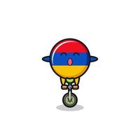 The cute armenia flag character is riding a circus bike