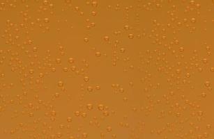 Macro shot of orange effervescent bubbles of calcium and vitamin C effervescent tablets in transparent glass