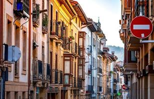 Building in Spain. Architecture in city. Urban building in residential area in Spain. Street view in Europe. Travel in Spain concept. Town in Europe. photo