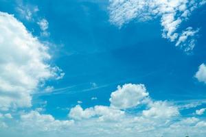 Beautiful blue sky and white cumulus clouds abstract background. Cloudscape background. Blue sky and fluffy white clouds on sunny day. Nature weather. Bright day sky for happy day and space. photo