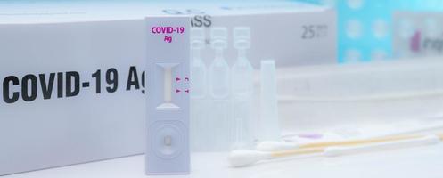 Covid 19 antigen self test for nasal swab. Antigen test kit for home use to detection coronavirus infection. Rapid antigen test. Corona virus diagnosis. Medical device for covid-19 antigen test. photo