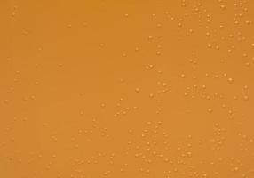 toma macro de burbujas efervescentes naranjas de tabletas efervescentes de calcio y vitamina c en vidrio transparente foto