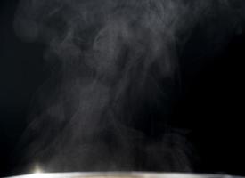 White and gray steaming on black abstract background with copy space for text. photo