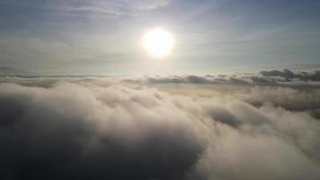 Aerial sliding over the cloud in sunrise video