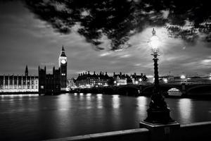 Big Ben, London the UK at sunset. Retro street lamp light on Westminster Bridge. Black and white photo