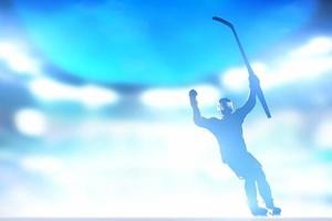 Hockey player celebrating goal, victory with hands and stick up photo