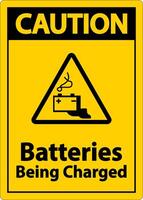 Caution Batteries Being Charged Sign On White Background vector