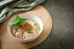 Pho Bo vietnamese soup with pork and rice noodles photo