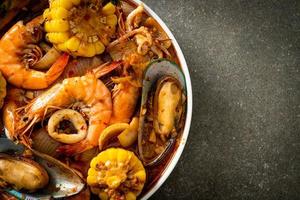 spicy barbecue seafood - shrimps, sqiud, mussel photo