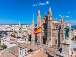 Aerial view of the Spanish flag near the La Seu in Mallorca, Spain.
