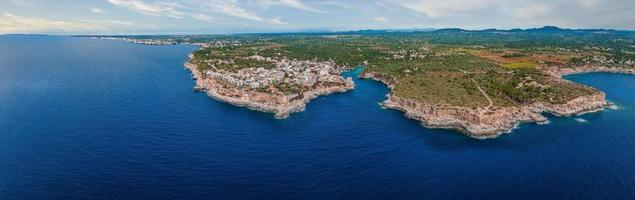 Aerial view, Cala d'es Moro, rocky coast at Cala de s'Almonia photo