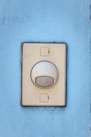 Old door bell switch button photo