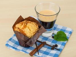 Muffin with espresso photo