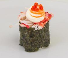 sushi kani with sauced slices of crab shrimp isolated on white background photo