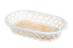 Wickerwork empty yellow breadbasket on white background photo