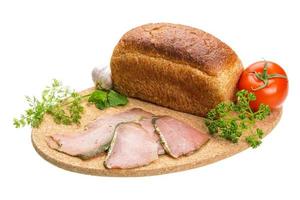 Ripe fresh ham with vegetables photo