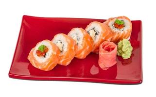 Japanese sushi traditional japanese food.Roll made of salmon, red cavair, roe and cream photo