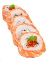 Japanese sushi traditional japanese food.Roll made of salmon, red cavair, roe and cream photo