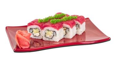 Maki Sushi - Roll made of Crab, avocado, cucumber inside. Fresh Tuna and tobico roe outside photo