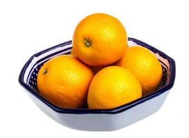 Heap of oranges in the dish photo