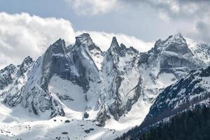 Granite mountains with snow photo