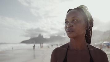 Latin young girl, famous beach Rio de Janeiro, Brazil. Latin summer vacation holiday. photo