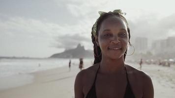 Latin young girl, famous beach Rio de Janeiro, Brazil. Latin summer vacation holiday. photo