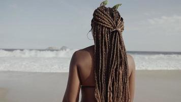 Latin young girl, famous beach Rio de Janeiro, Brazil. Latin summer vacation holiday. photo