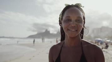 Latin young girl, famous beach Rio de Janeiro, Brazil. Latin summer vacation holiday. photo